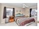 Spacious bedroom with a king-size bed and wood furniture at 8137 Sw 117Th Loop, Ocala, FL 34481