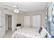 Guest bedroom with full-size bed and double closets at 8137 Sw 117Th Loop, Ocala, FL 34481