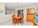 Bright dining area with wooden table and hutch at 8137 Sw 117Th Loop, Ocala, FL 34481