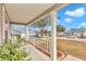 Relaxing front porch with rocking chairs and white railing at 8137 Sw 117Th Loop, Ocala, FL 34481