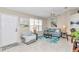 Bright living room with comfy couch and ocean-themed decor at 8137 Sw 117Th Loop, Ocala, FL 34481