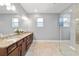 Double vanity bathroom with granite countertop at 9010 Sw 89Th Loop, Ocala, FL 34481