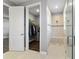 Bathroom with walk-in shower, closet, and modern vanity at 9010 Sw 89Th Loop, Ocala, FL 34481