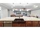 Kitchen with farmhouse sink and stainless steel appliances at 9010 Sw 89Th Loop, Ocala, FL 34481