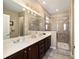 Elegant bathroom with double sinks, shower, and modern fixtures at 9872 Sw 99Th Loop, Ocala, FL 34481