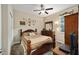 Bedroom with wooden furniture, and carpet flooring at 9872 Sw 99Th Loop, Ocala, FL 34481