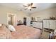 Bright bedroom with king-size bed and access to bathroom and closet at 9872 Sw 99Th Loop, Ocala, FL 34481