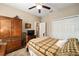 Bedroom with wooden furniture and carpet flooring at 9872 Sw 99Th Loop, Ocala, FL 34481