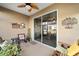 Relaxing covered patio with sliding glass doors at 9872 Sw 99Th Loop, Ocala, FL 34481