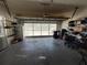 Spacious garage with overhead storage and shelving at 11105 Sw 69Th Cir, Ocala, FL 34476