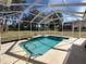 Relaxing screened pool and patio area with lush landscaping at 11105 Sw 69Th Cir, Ocala, FL 34476