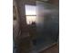 Walk-in shower with built-in seat and glass enclosure at 11105 Sw 69Th Cir, Ocala, FL 34476