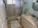 Updated bathroom with tub, shower, and light color palette at 11490 Sw 85Th Ave, Ocala, FL 34481