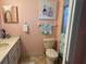 Clean bathroom with a toilet, sink, and shower at 11490 Sw 85Th Ave, Ocala, FL 34481