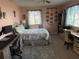 Bedroom with a double bed, desk and window at 11490 Sw 85Th Ave, Ocala, FL 34481