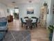 Elegant dining room with chandelier and hardwood floors at 11490 Sw 85Th Ave, Ocala, FL 34481