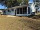 Single story home with large backyard and screened porch at 11490 Sw 85Th Ave, Ocala, FL 34481