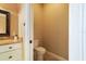 Small powder room with single vanity and toilet at 1219 Se 46Th St, Ocala, FL 34480