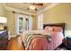 Bright bedroom with double doors leading to the backyard at 1219 Se 46Th St, Ocala, FL 34480