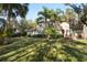 Two-story house with palm trees and holiday decorations at 1219 Se 46Th St, Ocala, FL 34480