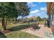 Patio with seating area and view of backyard at 12498 Se 92Nd Ave, Summerfield, FL 34491