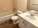 Clean bathroom with a single vanity, toilet, and tub at 15120 Sw 39Th Cir, Ocala, FL 34473