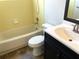 Clean bathroom with a bathtub, toilet and vanity at 15120 Sw 39Th Cir, Ocala, FL 34473