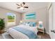 Third bedroom with a queen bed and light decor at 18 Juniper Trl, Ocala, FL 34480