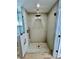 Spa-like bathroom with a large walk-in shower at 1846 Ne 127Th Pl, Anthony, FL 32617