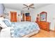 Spacious bedroom with wood floors and ample closet space at 20189 Sw 77Th St, Dunnellon, FL 34431