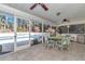 Relaxing screened porch overlooks the refreshing pool at 20189 Sw 77Th St, Dunnellon, FL 34431