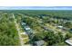 Aerial view of the house and surrounding area, highlighting its neighborhood setting at 21654 Sw Honeysuckle St, Dunnellon, FL 34431