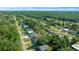 Aerial view showing the house's location within the community, highlighting its lot size at 21654 Sw Honeysuckle St, Dunnellon, FL 34431