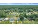 Aerial view of residential neighborhood showcasing home and surroundings at 21654 Sw Honeysuckle St, Dunnellon, FL 34431