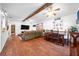 Open living and dining area with wood floors at 21654 Sw Honeysuckle St, Dunnellon, FL 34431