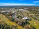 Aerial view showing home's location in a community with surrounding landscape at 231 Ne 28Th Ave # 204, Ocala, FL 34470