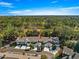 Wider aerial showcasing the property's surroundings at 231 Ne 28Th Ave # 204, Ocala, FL 34470