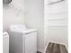 Laundry room with washer, dryer, and ample storage at 2457 Bulrush Dr, Saint Cloud, FL 34769