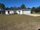 One-story house with attached garage and grassy yard at 2520 Sw 143 Ave, Ocala, FL 34481