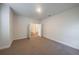 Bright bedroom with carpet flooring and access to another room at 3914 Ne 58Th Cir, Silver Springs, FL 34488