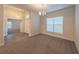 Bright dining room with carpeted floors and neutral walls at 3914 Ne 58Th Cir, Silver Springs, FL 34488