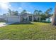 Single-story house with a two-car garage and well-maintained lawn at 3914 Ne 58Th Cir, Silver Springs, FL 34488