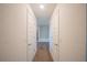 Hallway with doors leading to bathroom and other rooms at 3914 Ne 58Th Cir, Silver Springs, FL 34488