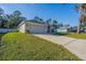 Single-story home with driveway and yard at 3914 Ne 58Th Cir, Silver Springs, FL 34488