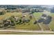 Wide aerial view showing the property and surrounding area at 3996 Se 150Th St, Summerfield, FL 34491