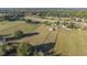 Vast aerial view of the property and surrounding farmlands at 3996 Se 150Th St, Summerfield, FL 34491