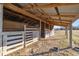 rustic barn with multiple stalls, perfect for horses or livestock at 3996 Se 150Th St, Summerfield, FL 34491