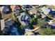 Aerial view of two-story house with gray roof and driveway at 4098 Sw 51 St, Ocala, FL 34474