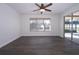 Light-filled bedroom with sliding glass doors leading to the backyard at 4098 Sw 51 St, Ocala, FL 34474