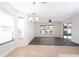 Spacious dining room with dark wood floors and lots of natural light at 4098 Sw 51 St, Ocala, FL 34474